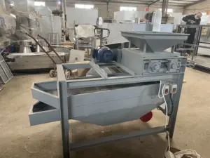 Almond shelling machine