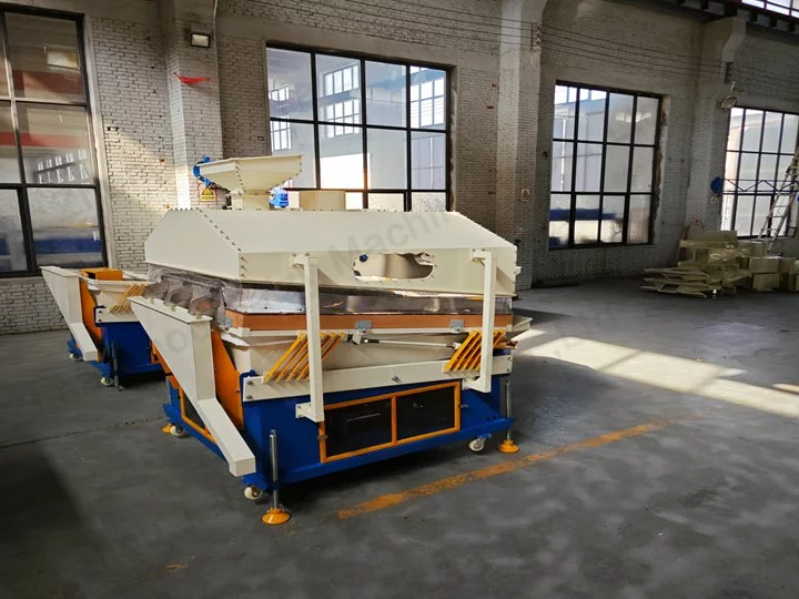 कोको बीन्स पत्थर निकालने का उपकरण