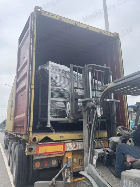 Hazelnut shelling machine being loaded for shipment